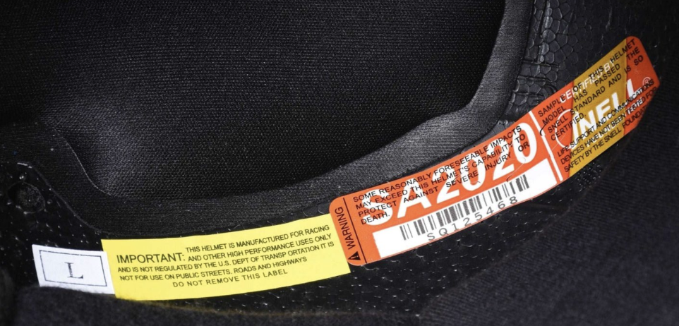 Snell SA2020 certification sticker inside a helmet